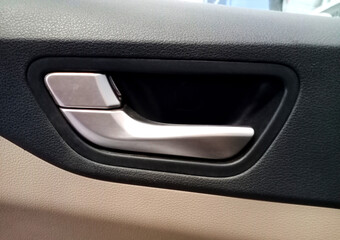 Closeup view of inner Car door Handle