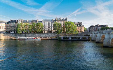 bridge Pont Neuf and Seine river with old houses of Cite island, Paris, France