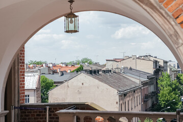 Vintage Lantern Overlooking Old City Rooftops