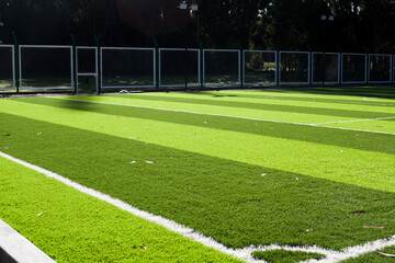 Photograph of a synthetic soccer field. Concept of sports industries.