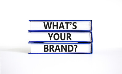 Branding and what is your brand symbol. Concept words What is your brand on beautiful books. Beautiful white table white background. Business branding and what is your brand concept. Copy space.