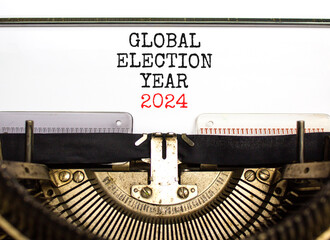 Global election year 2024 symbol. Concept words Global election year 2024 typed on beautiful old retro typewriter. Beautiful white background. Business Global election year 2024 concept. Copy space