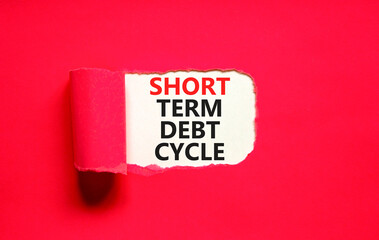 Short term debt cycle symbol. Concept words Short term debt cycle on beautiful white paper. Beautiful red background. Business Short term debt cycle concept. Copy space