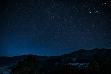 Crystal clear and bright starry sky with sea of clouds at the Ogasawara Mountain observation deck...