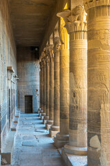 Ancient egyptian carvings on columns in Philae temple in Aswan, Egypt - 753702283