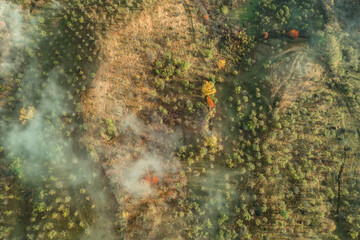 Morning view with mountain village and fog an clouds in Romania