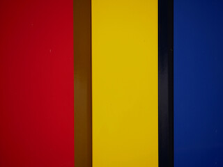 red yellow and blue stripes of wooden boards