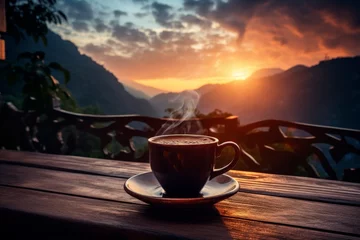 Poster Breathtaking landscape at sunrise with steaming coffee cup illuminated by soft golden sunlight © Emvats