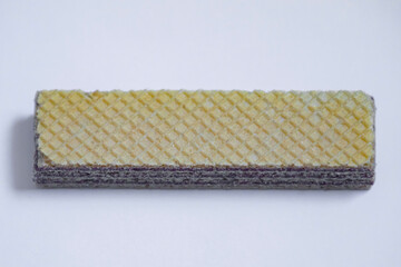 Chocolate wafer cookie isolated and in selective focus