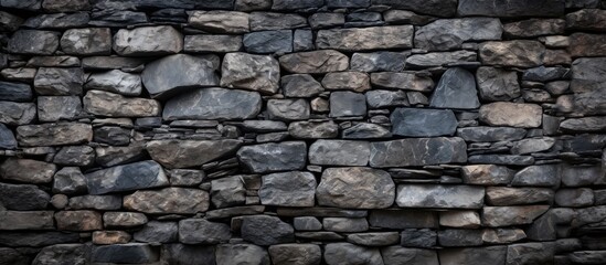 Fototapeta premium Texture of a stone wall for backdrop
