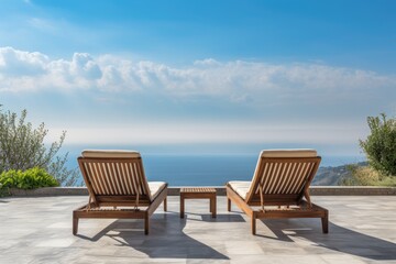 Fototapeta premium Wooden deck chairs on the terrace of a luxury house with sea view, empty wood chair and table at the outdoor patio with beautiful tropical beach, Ai Generated