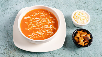 Tomato soup, crackers and cheese