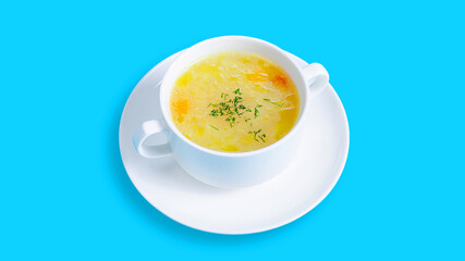 Chicken soup bowl isolated on blue