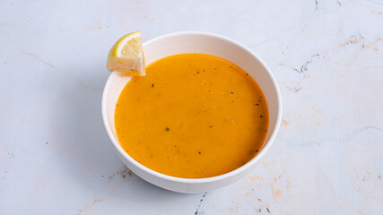 Lentil soup bowl isolated on white