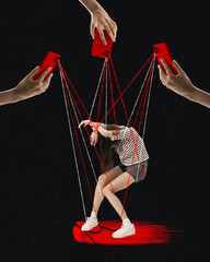 Contemporary art collage. Strings protruding from mobile cameras control depressed girl like puppet...