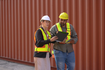 Manager survey load container for shipping plan in Logistic container area company.