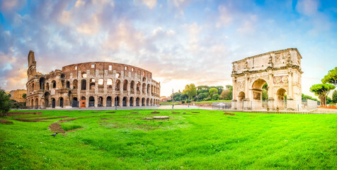 Fototapeta na wymiar ruins of antique Colosseum and Arch of Constantine in sunise lights, Rome Italy