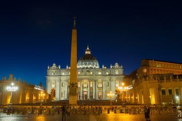 St. Peter's cathedral in Rome at night with lights, Italy