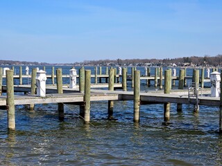 Wooden pilings and walkways in a vacant Michigan marina