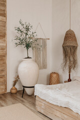 Stylish modern wabi sabi bedroom with bed and lamps