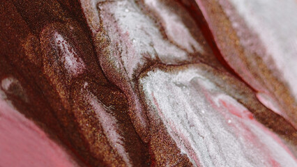Shimmering ink background. Wet pigment. Shiny flow. Sparkling brown liquid with white substance...
