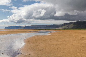 Fototapeta na wymiar panoramic view over the low water level Rauðisandur beach in Iceland in summer 