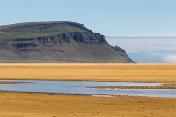 Fototapeta na wymiar panoramic view over the low water level Rauðisandur beach in Iceland in summer 