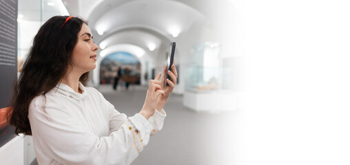 Web banner of digital museum app. Side view of young Caucasian woman using smartphone. Copy space...