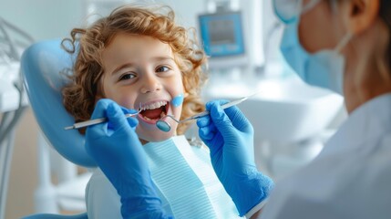 A child looks at the dentist while the dentist examines his teeth