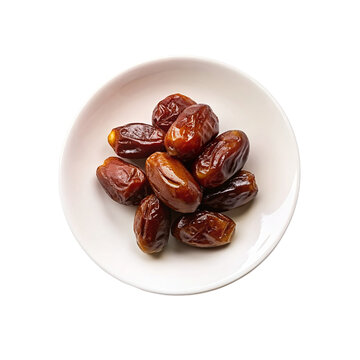 Dates fruit in a plate isolated on transparent background. Top view.