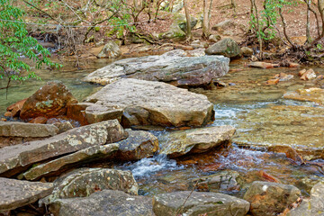 Fototapeta na wymiar A trail that crosses over a creek