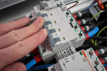 electrician working on a fuse