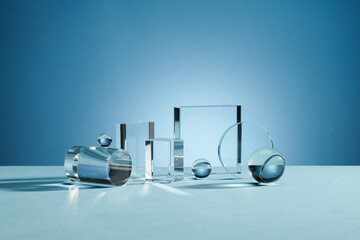 Transparent geometric stand for cosmetics.