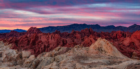 Dramatic Sunrise over rocky landscape terrain. Valley of Fire, Nevada, United States.
