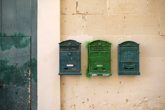 Mailboxes On A Wall
