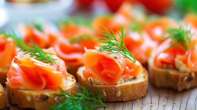 a wooden table topped with slices of bread covered in salmon and garnished with a sprig of dill.