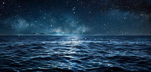 A image of a starry night sky over a tranquil, dark blue ocean, capturing the reflection of stars on water and the vastness of the universe - obrazy, fototapety, plakaty