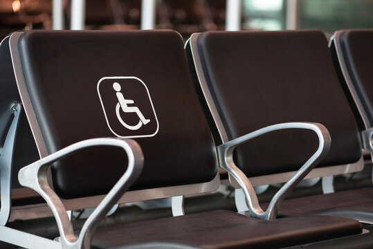 Seat for discapacity people with the logo on white color.