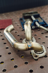 Welded production of external wastegate manifold from stainless steel, exhaust manifolds in a...