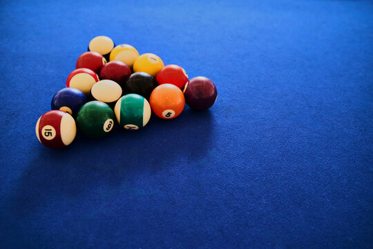Balls set up for game on pool table
