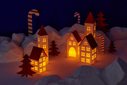 cute small houses at night, happy winter holidays - Powered by Adobe