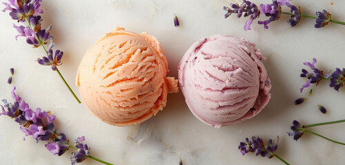 A duo of peach and lavender sorbet scoops, their soft, pastel hues offering a visually soothing and flavorful experience
