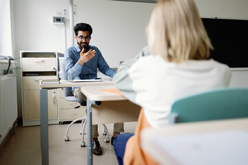 Classroom teacher explain lesson pupil learn