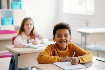 Funny sheerful pupil eye contact education classroom