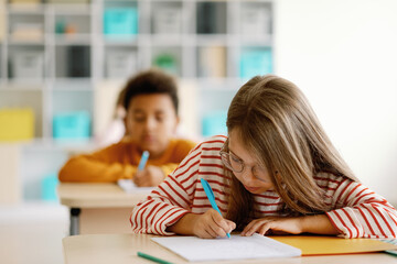 Concentrated student elementary school classmates portrait