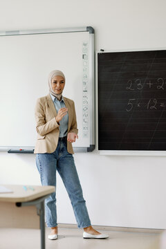 Schoolteacher leading math class