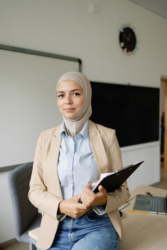 Woman working as teacher at school 