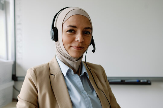 Teacher modern tech headphones distance learning professional positive