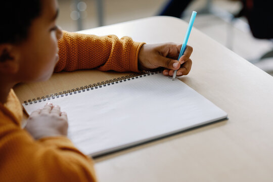 Stationery notebook lesson writing pupil multiethnic 