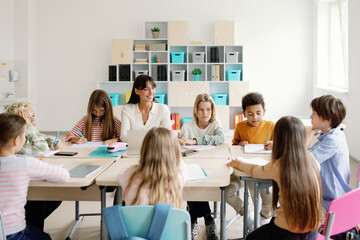 Classmates  and tutor creativity and doing tasks at school